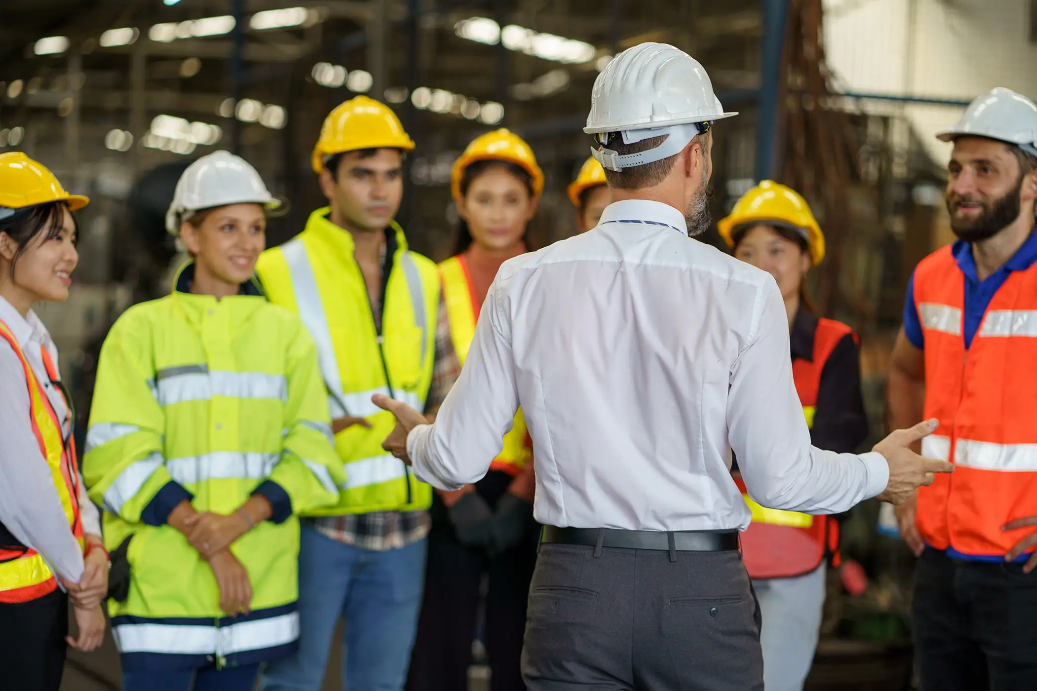 group of diversity engineer factory worker standing in morning meeting